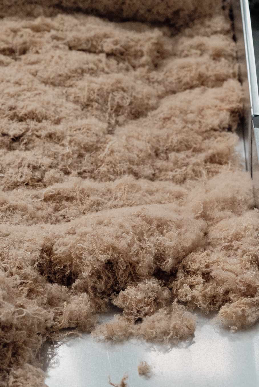 Fibre sostenibili materiali riciclati cashmere rigenerato moda circolare Rifò
